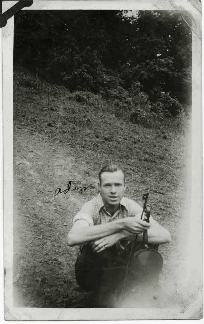 Man holding fiddle