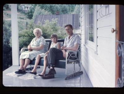 Family sitting on porch