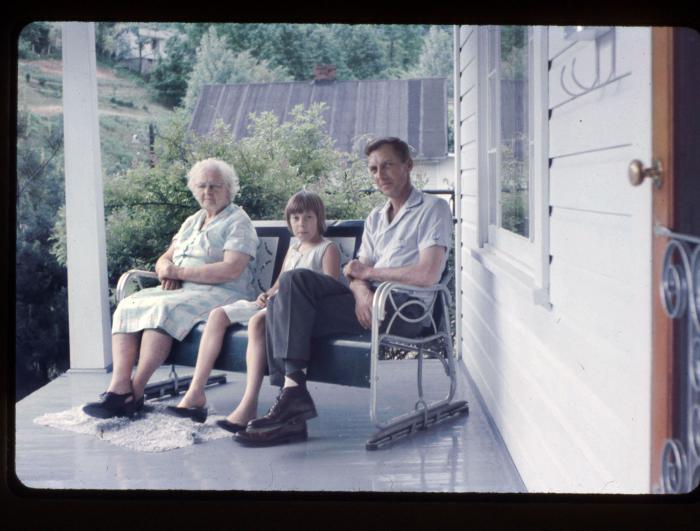 Family sitting on porch