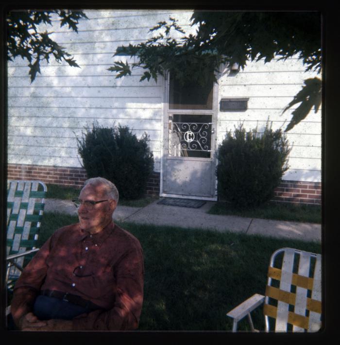 Man sitting in lawn chair