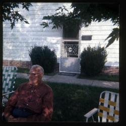 Man sitting in lawn chair