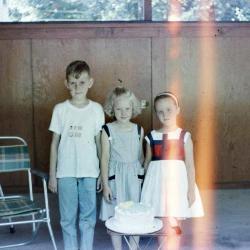 Children with a birthday cake