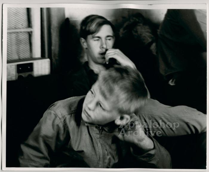 Production still of two young men - The Struggle of Coon Branch Mountain
