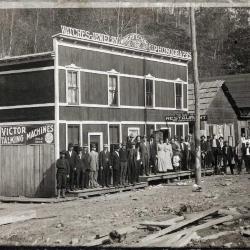 Line of people standing outside store