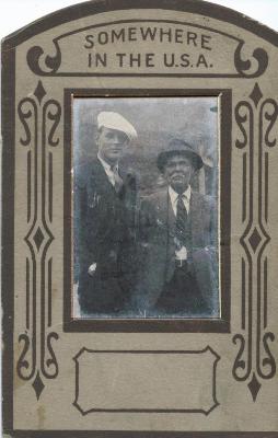 Portrait of two men in novelty cardboard frame