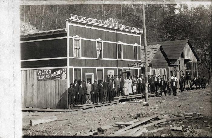 Line of people standing outside store