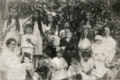 Group of women and children posing for photo
