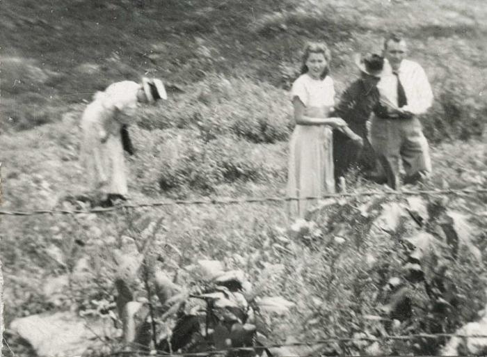 Four people in a field