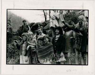 Production still of group of children waving, exterior - The Struggle of Coon Branch Mountain