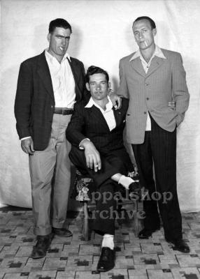Studio portrait of 3 men in suits