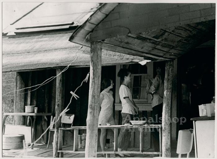 Production still of people on porch - The Struggle of Coon Branch Mountain
