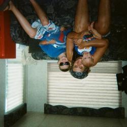 Woman and two boys on sofa
