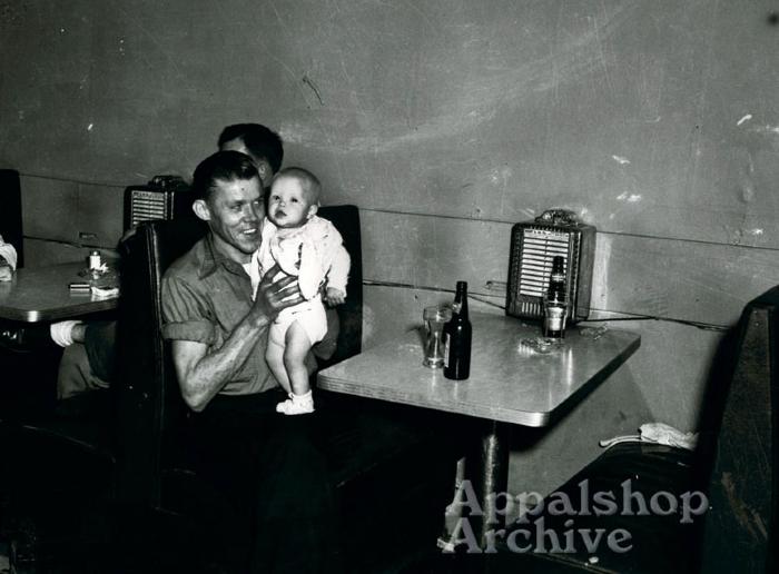A man holding a baby