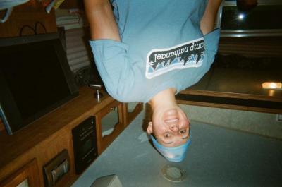 Woman in light blue cap and t-shirt