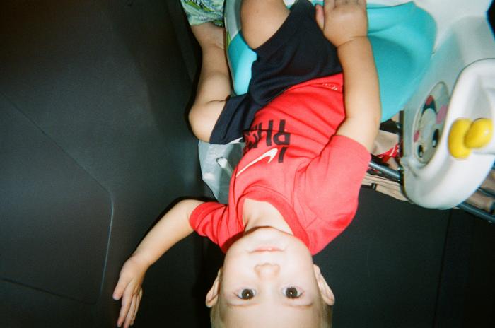 Toddler in back seat of car