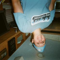 Woman in light blue cap and t-shirt