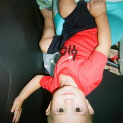 Toddler in back seat of car