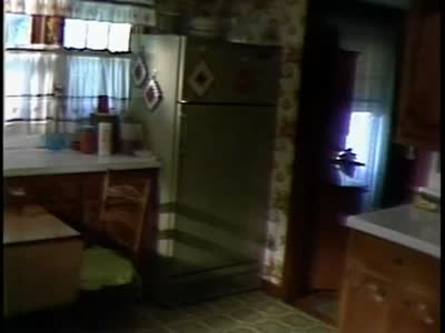 Footage of Morgan and Virgie Sexton in the kitchen
