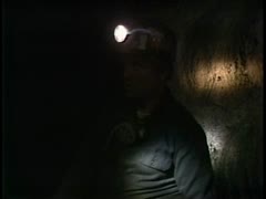 Footage inside coal mine, discussion of jokes, animals