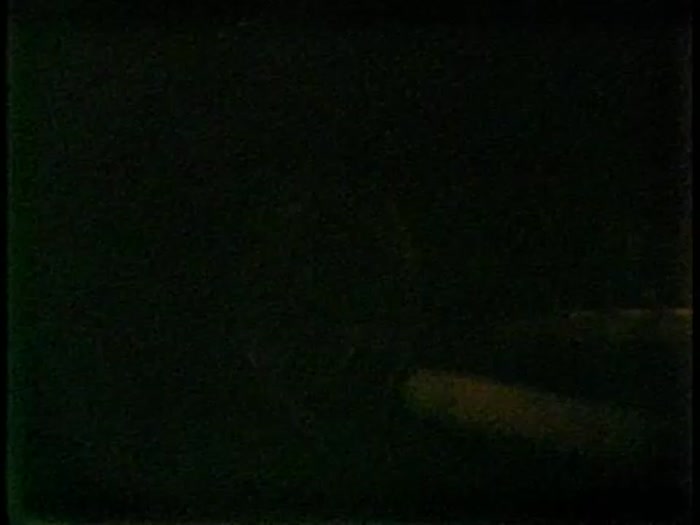 Footage inside coal mine, with machine noise and mostly dark