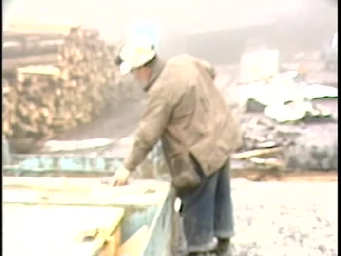 Footage outside coal mine, shift change