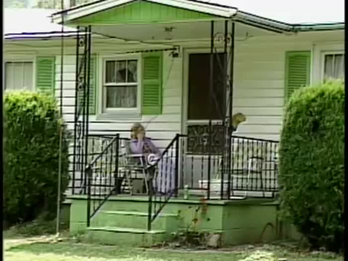 Footage of Morgan and Virgie Sexton outside their home, family photos