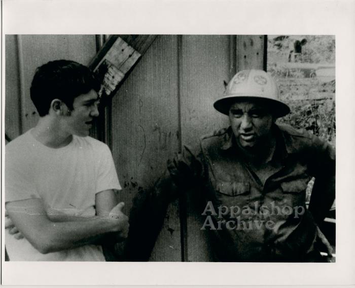 Coal miner and Herb E. Smith in conversation (In Ya Blood)