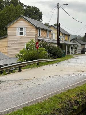 The water starting in the road 