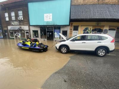 Charlie Calhoun using car to jump rescuer Jetski