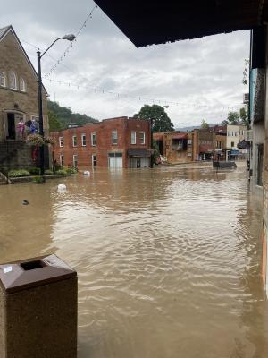 View NE of river flooding on Main Street  