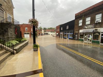 Waters overtaking Main Street bridge  
