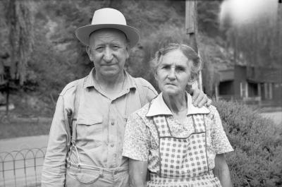 Exterior portrait of couple with road in background