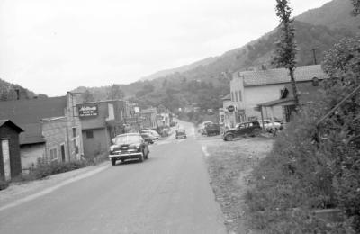 Cars driving through business area