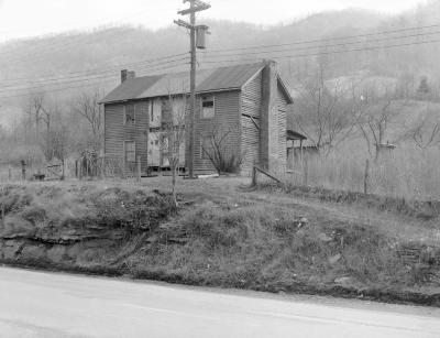 Exterior of large clapboard-sided building