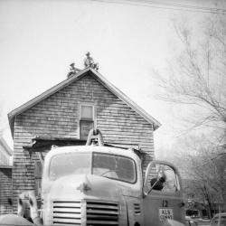 Portrait of two men on roof