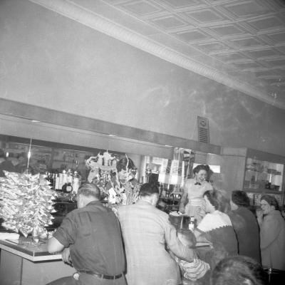 Cafe interior with laughing waitress
