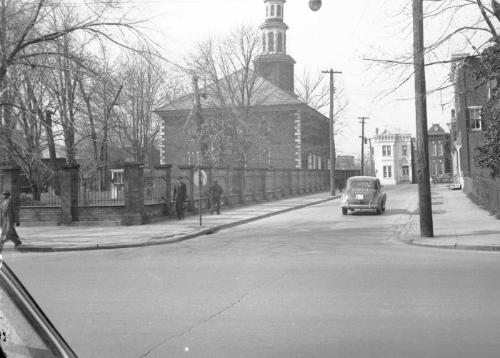 Intersection with brick building in background