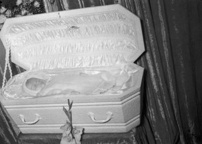 Deceased baby in casket