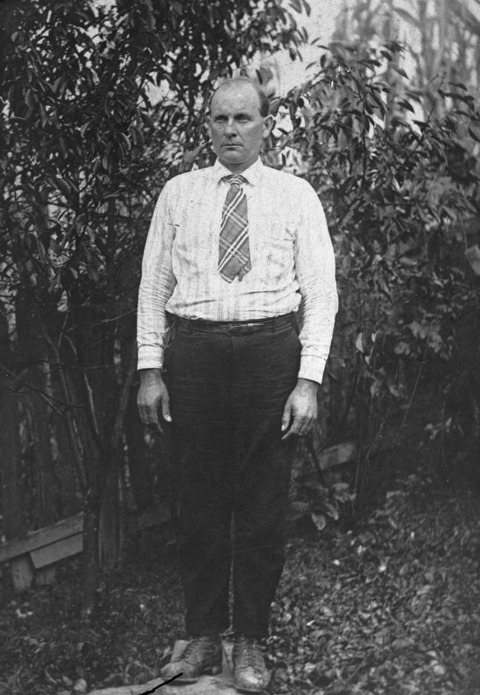 Portrait of man standing on rock