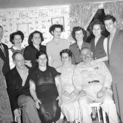 Group portrait of A.J. "Banjo" Haynes and family (Banjo Haynes smiling version)