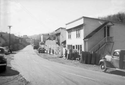Curved street lined with businesses