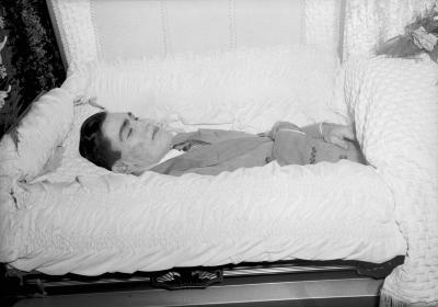Portrait of deceased man in casket, likely Denver Wright