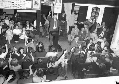 Church crowd with hands raised