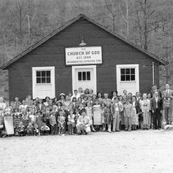 Crowd gathered in front of Church of God Headquarters, centered