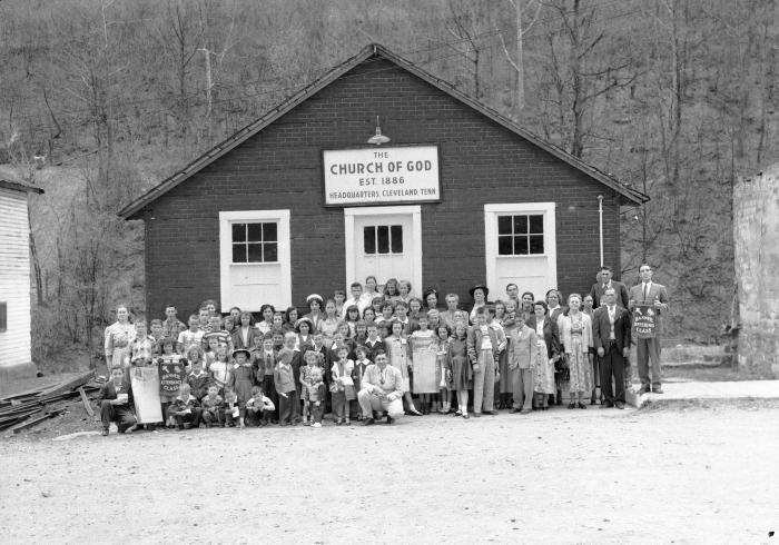 Crowd gathered in front of Church of God Headquarters, centered