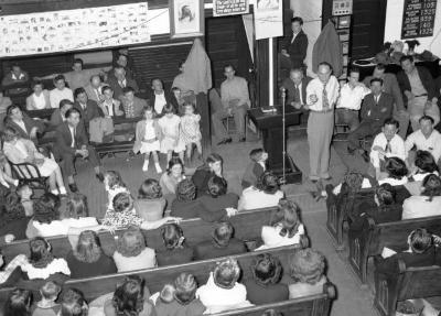 Preacher addressing congregation