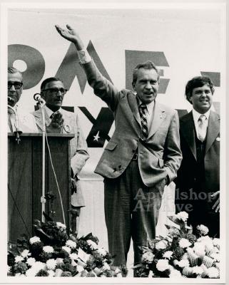 Richard Nixon waving to crowd