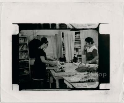 Film still of two seamstresses - Millstone Sewing Center