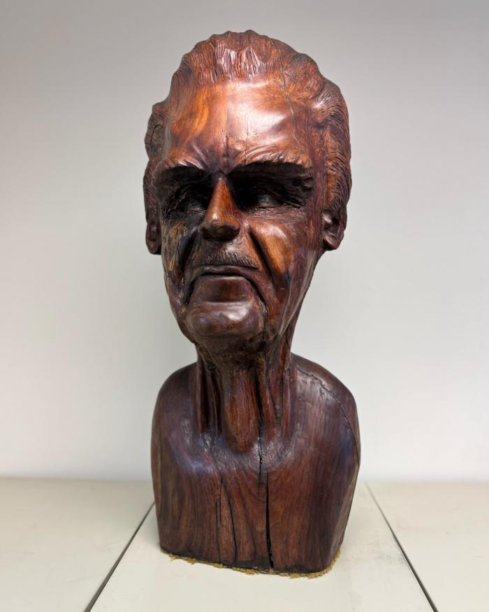 Carved wooden bust self-portrait by Fred Carter