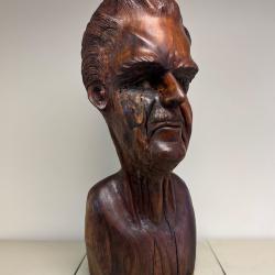 Carved wooden bust self-portrait by Fred Carter